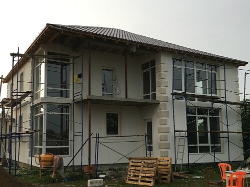 Отделка фасада дома штукатуркой в Смолевичах